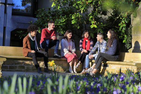 Students Relaxing by Portico