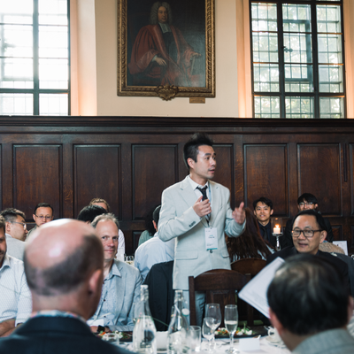 Dr Chao He at conference dinner in Hall