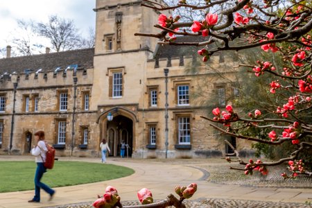 front-quad-flowers-red-students